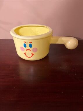 Vintage 1983 Yellow Smiley Plastic cooking pot w/handle toy by The First Years